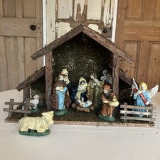Christmas Nativity Set And 11 Hand Painted Porcelain Figures & Musical Stable
