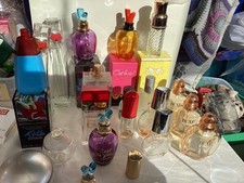 Job lot of empty Perfume Bottles. Some in original boxes 