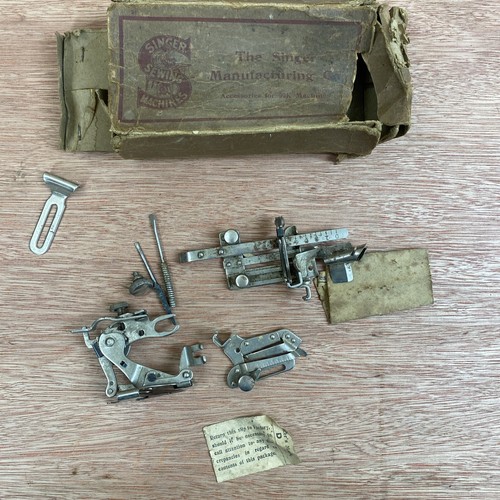 Box singer sewing machine - of,