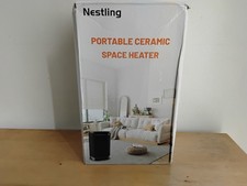  portable ceramic space heater by nestling