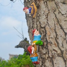 Funny climbing gnome - gnome, statue