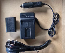 Battery and travel charger for