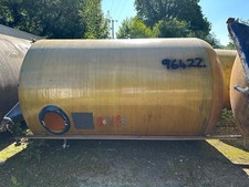 10,000litre vertical Fibreglass tanks on legs.  2m diameter 2.95m straight side