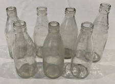 7x Vintage milk bottles