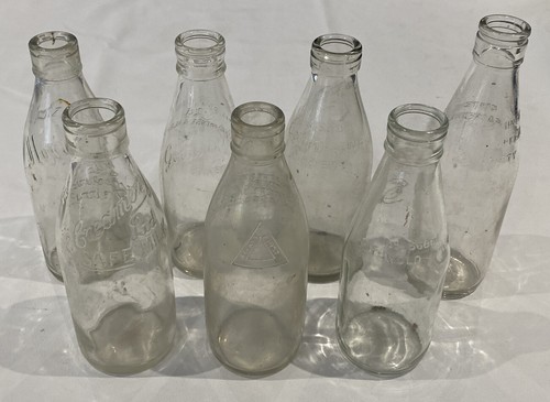 Vintage milk bottles - 7x,