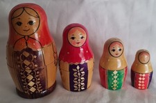 Set of 4 Vintage Stacking Russian Matryoshka Hand painted Dolls