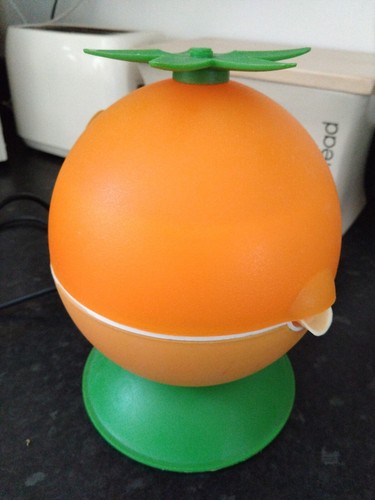Vintage orange juicer - orange,