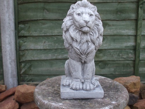 Sitting stone lion statue - ,