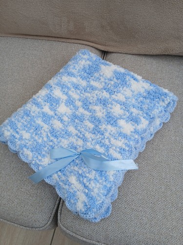 Hand knitted pale blue and - pale,