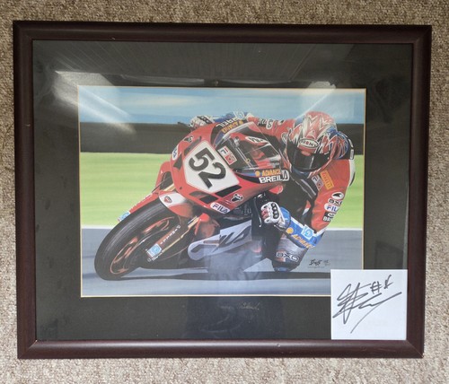 Framed signed picture - signed,
