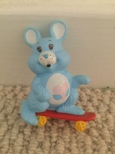 Vintage 1980s Care Bear Cousins Swift Heart Rabbit on a skateboard