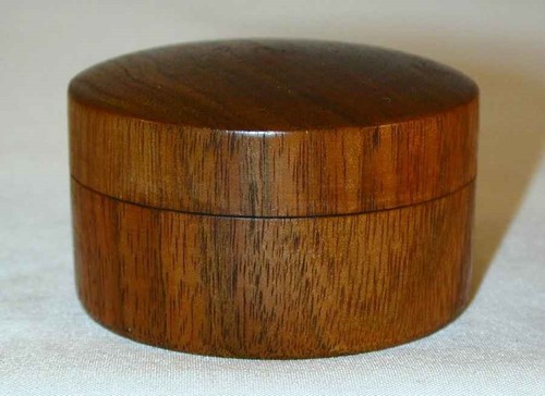 Two small turned wood items - small,