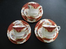 SET OF THREE PARAGON ROCKINGHAM BURGUNDY CUP, SAUCER , SIDE PLATE TRIOS SECONDS