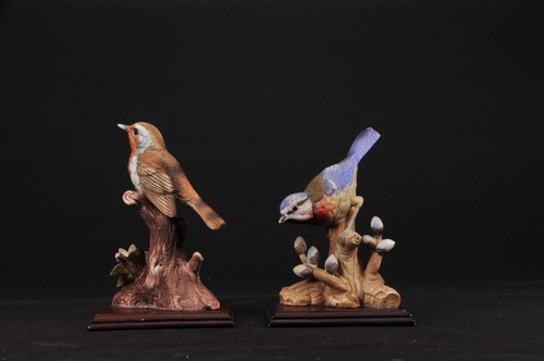 Ceramic garden bird figurines