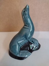 COLLECTABLE POOLE POTTERY .GLAZED ,DARK TEAL BLUE ,SEAL SEA LION HEIGHT 4.5inch