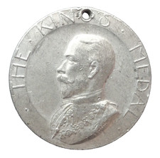 George V London County Council School attendance medal dated 1910-1911