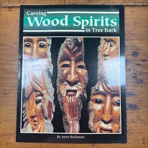 Carving wood spirits - in, tree