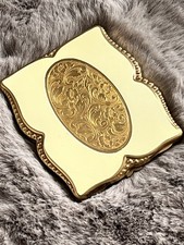 Vintage 1950s Unused Pygmalion Powder Compact. Cream enamel and embossed gilt 