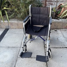 CareCo Lightweight & Portable Wheelchair With Backpack & Raincover