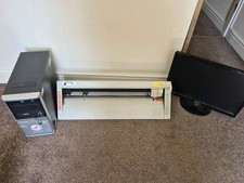 Roland Pnc 950 CAMM 1 signwriting plotter with monitor and base unit.