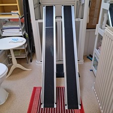 Telescopic Ramps. 4Ft and extends to 7 ft. In excellent condition,  carry case.