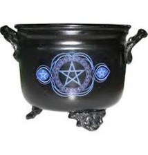 Metal Cauldron With a Blue