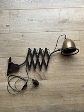 Scissor lamp in patinated iron