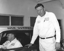 Walter Bud Moore stands beside