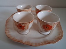 SWINNERTONS 4 egg cups & plate