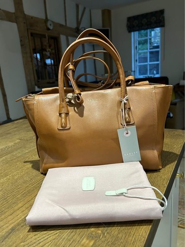 Pre owned with tags - with,