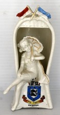 CRESTED CHINA/FAIRGROUND FAIRING: BRIGHTON (SUSSEX) CREST MODEL BATHING BELLE