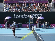 Photo 6x4 Sitting under purple