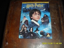 DVD OF THE HARRY POTTER AND THE PHILOSOPHER'S STONE AND IS USED