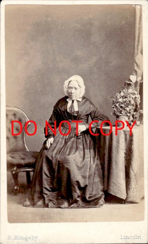 Older woman sitting slingsby - woman,