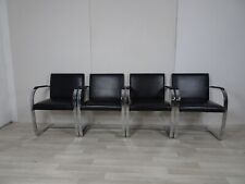 A  set of 4 Knoll Studio Mies Vander BRNO chairs in black vinyl