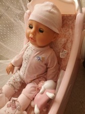 Baby Annabell musical lullaby carriage with drapes.