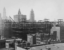 Labourers high up frame a