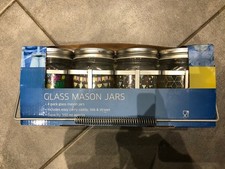 4 glass mason jars with straws