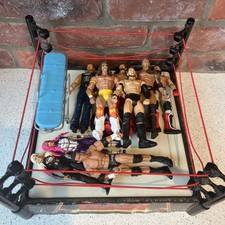 WWE Raw Ring + 9  (nine)x 9 ‘ figures 