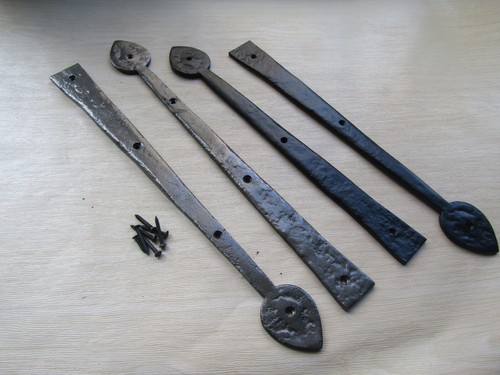Pair spear head - of, rustic