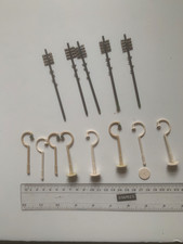 Hornby 00 gauge lamp stands, some broken and telegraph poles