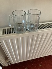 Pair of 1/2 Pint Glass Tankards Heineken