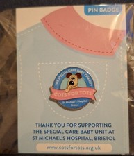Charity pin badge cots for