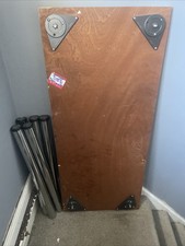 wooden desk with metal hairpin