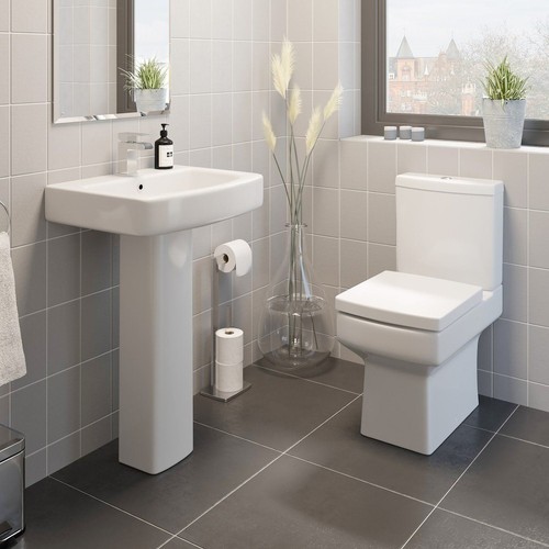 Close coupled toilet and basin - close,