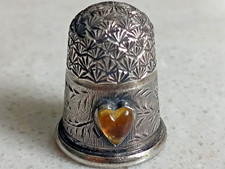 UNUSUAL SOLID SILVER CHARLES