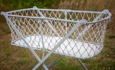 Victorian wrought iron folding cot on casters