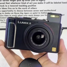 Panasonic LUMIX DMC-LX3 Digital Camera 10.1 MP 2.5x Optical Zoom With Charger