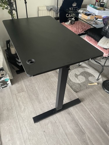 Black desk that goes and - desk,