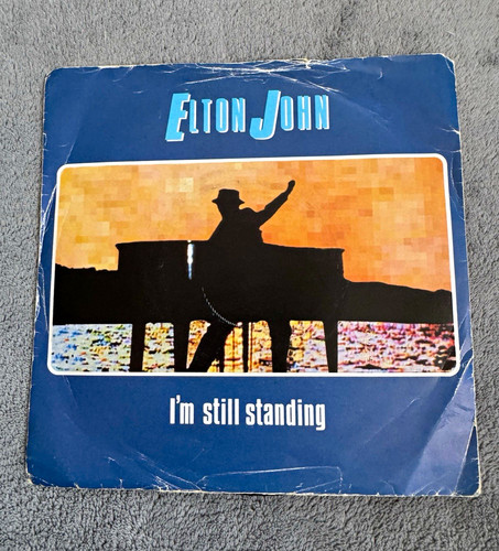 Elton john rocket 45rpm - rocket,